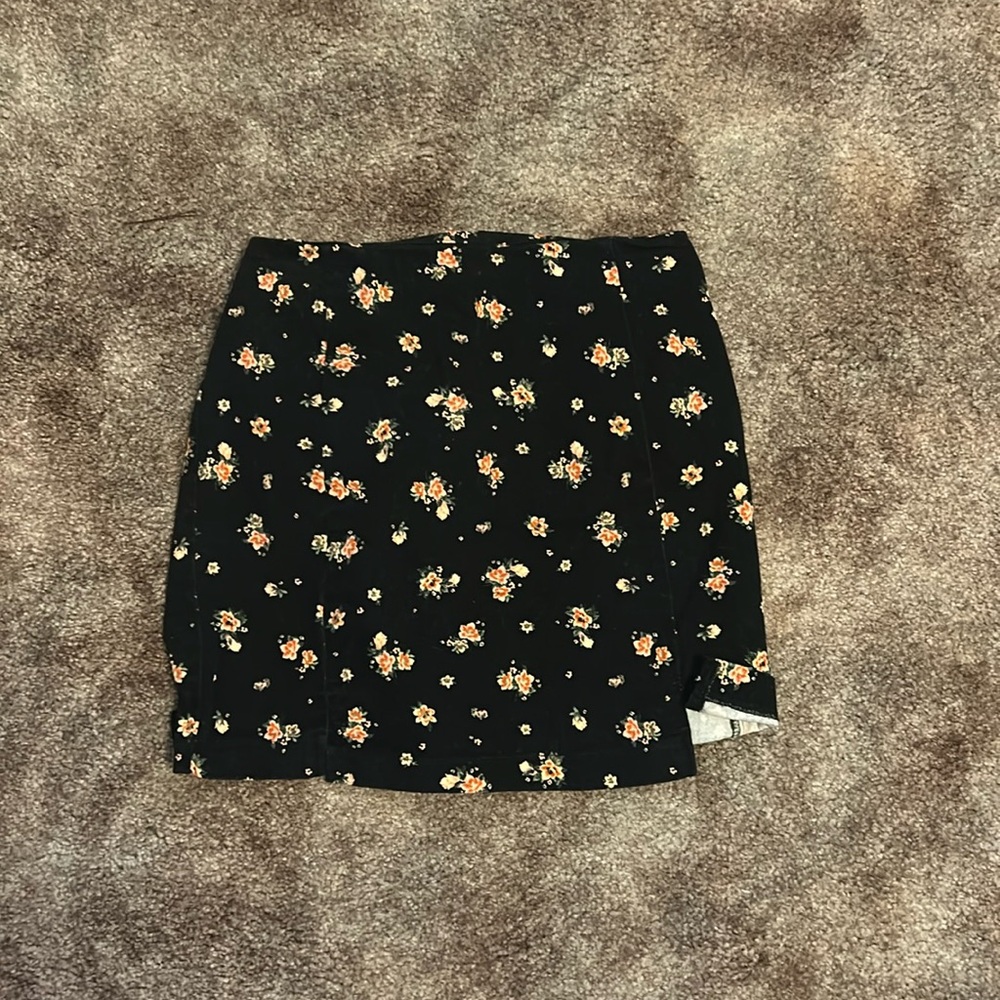 Cute black mini skirt with flowers
